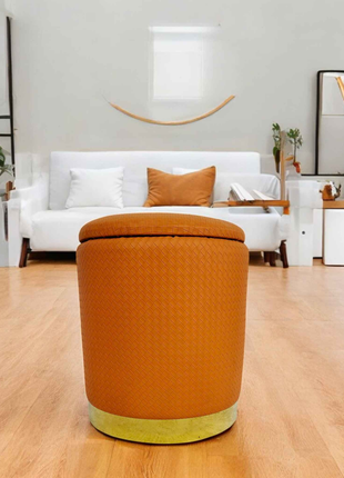 Orange Textured Ottoman with Gold Base – Luxury Round Footstool for Modern Living Spaces