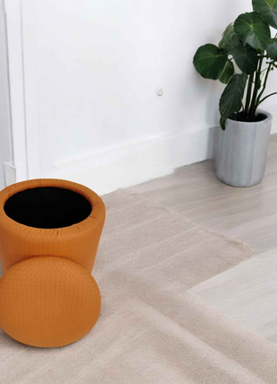 Orange Textured Ottoman with Gold Base – Luxury Round Footstool for Modern Living Spaces