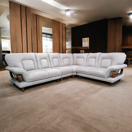 Contemporary Curved L-Shape Sofa in Cream Leatherette with Wooden Accents – 7-Seater Luxury Sectional